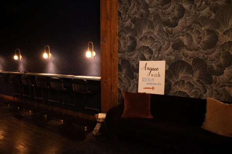 A sign pointing guests to a discussion session at the launch event